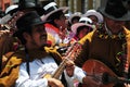 Carnival of Tacna Peru, tradition of Andean migration-couples dancing with multicolored clothes