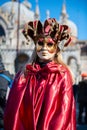 Carnival of Venice. Colorful carnival mask at a traditional festival in Venice, Italy. Beautiful mask at masquerade in Piazza San