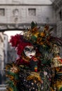 Carnival of Venice 2023 Model in Colorful Costume at the Bridge of Sighs Portrait