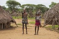 Caro men pose in front of the camera for a group photo.Ethiopia, Omo Valley