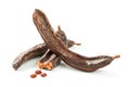 Carob carob fruit and seeds on white background. Isolate. Organic carob beans, a healthy alternative to cocoa