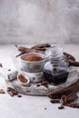 Carob pods, powder and molasses or syrup Royalty Free Stock Photo