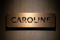 Caroline metal name plate golden colour Royalty Free Stock Photo