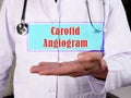 Carotid Angiogram phrase on the piece of paper