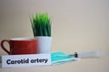 Carotid artery text, grass pot, coffee cup, syringe, and face green mask.