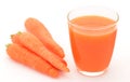 Carrots juice in glass isolated on white Royalty Free Stock Photo