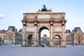 Carousel Arch of Triumph with Louvre museum at background, Paris, France