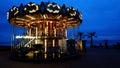 Carousel on the beach in the rain Royalty Free Stock Photo