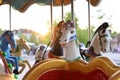 carousel for children horses slides toys summer laughter high quality rides sunset sun Royalty Free Stock Photo