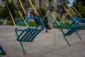 Carousel children`s seats run fast at amusement park