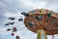 Carousel on cloudy sky background. Oktoberfest, Bavaria, Germany Royalty Free Stock Photo