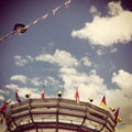 Carousel and a cloudy sky