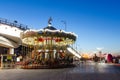 The carousel in the evening city