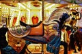 Carousel horse colorful closeup with lights