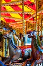 Carousel with horses on a carnival Merry Go Round Royalty Free Stock Photo