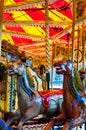 Carousel with horses on a carnival Merry Go Round Royalty Free Stock Photo