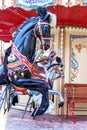 Carousel! Horses on a vintage, retro carnival merry go round. Royalty Free Stock Photo