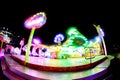 Carousel night in motion. Blur and motion effects Royalty Free Stock Photo