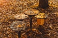 Carousel in the playground strewn with autumn leaves yellow season background Royalty Free Stock Photo