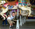 Carousel Ride for a Little Boy Royalty Free Stock Photo