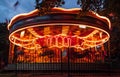 Carousel ride at night time spinning