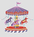 Carousel, roundabout or merry-go-round with adorable horses or ponies. Amusement ride for children`s entertainment Royalty Free Stock Photo