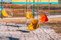 Carousels. Empty children`s attraction. Abandoned metal carousel playground. Royalty Free Stock Photo