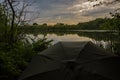 Carp fishing at sunset on a large Shropshire lake Royalty Free Stock Photo