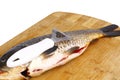 Carp and a knife for cleaning fish Royalty Free Stock Photo