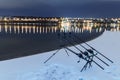 Carp spinning reel angling rods in winter night. Night Fishing