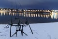 Carp spinning reel angling rods in winter night. Night Fishing