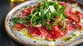 Carpaccio with Arugula and Parmesan on a Ceramic Plate. Close-up food photography