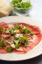 Carpaccio with arugula and parmesan cheese