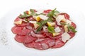 Carpaccio di Manzo. Carpaccio with veal, pesto and Parmesan