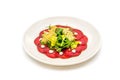 Carpaccio di Manzo. Carpaccio with veal, pesto sauce and Parmesan tuile