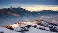 carpathian countryside with snow covered hills in morning light Royalty Free Stock Photo