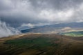 Carpathian mountain peaks landscape with heavy storm clouds Royalty Free Stock Photo