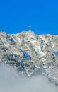 Carpathian mountains, Bucegi with Cross in top of Caraiman Peak