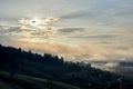 Carpathian mountains at dawn. Panoramic view of beautiful sunrise in ukrainian countryside in summer. Natural landscape, rural Royalty Free Stock Photo