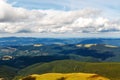 Carpathian mountains. Hiking. Panorama of the mountains. Sky with big clouds