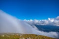 Mountains on a summer day in the fog