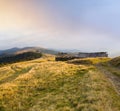 Carpathian Mountains Ukraine autumn landscape with cattle-breeding farm and country road Royalty Free Stock Photo