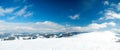 Carpathian mountains, Ukraine. Wonderful snow-covered firs against the backdrop of mountain peaks. Panoramic view of the Royalty Free Stock Photo