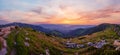 Carpathian summer dusk panorama view with rhododendron flowers, Chornohora, Ukraine