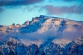 The Carpathians Bucegi Mountains Romania landscape winter snow ice clouds sunlight morning Royalty Free Stock Photo
