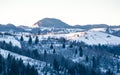 The Carpathians Bucegi Mountains Romania landscape winter snow ice clouds sunlight morning view Royalty Free Stock Photo