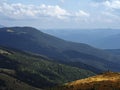 Carpatian mountains view from top at green forest