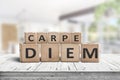 Carpe diem seize the day sign on a table Royalty Free Stock Photo