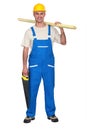 Carpenter carrying a saw Royalty Free Stock Photo