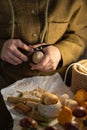 Carpenter carving wood with cutter knife. Female craftswoman creating wooden toys in workshop studio